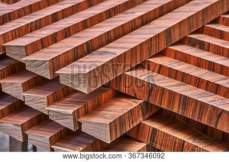 Joinery. Wood Veneer Wall Panels Elements Are Covered With Dust. Rosewood Reconstituted Veneer. Furn