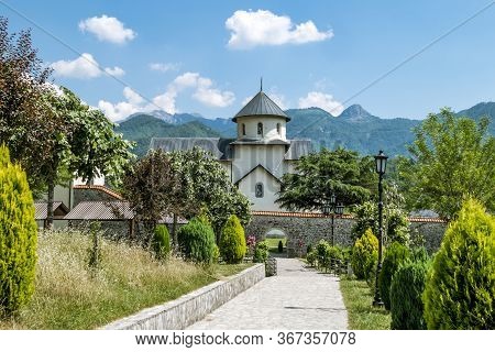 Moracha.montenegro.june 5, 2015.monastery On The River Moraca And Mountains In The Background