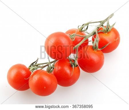 Fresh Organic Cherry Tomatoes Isolated On White Background. The Cherry Tomato Is Regarded As A Botan