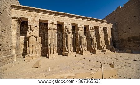 Temple Of Medinet Habu. Egypt, Luxor. The Mortuary Temple Of Ramesses Iii At Medinet Habu Is An Impo