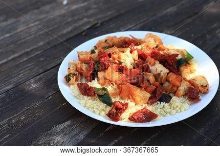 Cus Cus With Chicken Meat And Vegetables, Wooden Brown Background