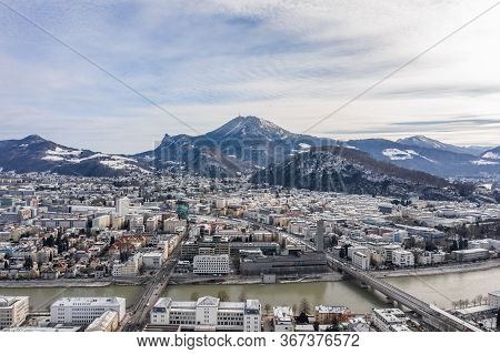 Aerial Drone Shot View Of Salzburg Northern City With View Of Gaisberg Summit And Kapuzinerberg Hill