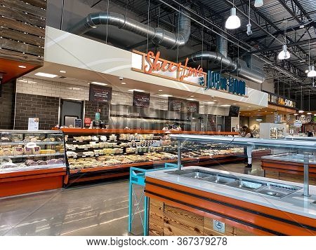 Orlando,fl/usa -5/10/20:  The Deli Counter Of A Whole Foods Market Grocery Store With Colorful Slice