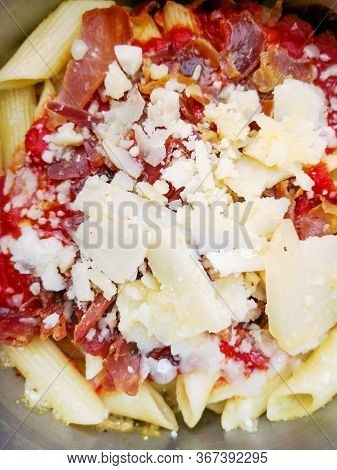 Radiatori pasta in a creamy tomato parmesan cheese sauce