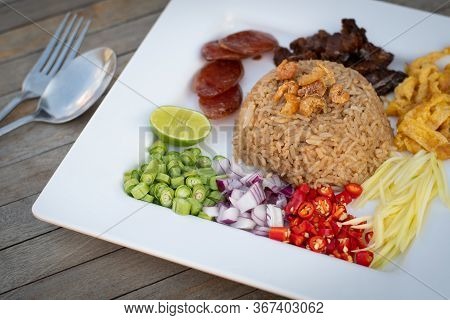 Thai Food - Kao Cluk Ka Pi (mixed Cooked Rice With Shrimp Paste Sauce) On White Round Dish. Fried Ri