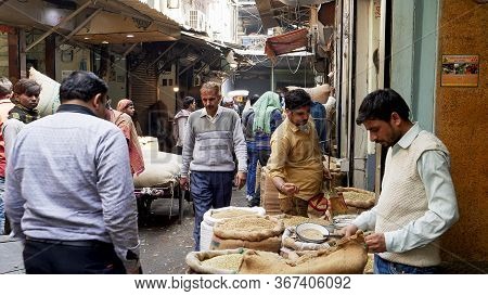 Delhi, India - March 14, 2019: A Busy Laneway At The Spice Market Of Chandni Chowk