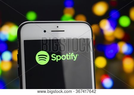 Calgary, Alberta, Canada. May 21, 2020. A White Iphone Plus With The Spotify Logo On The Screen