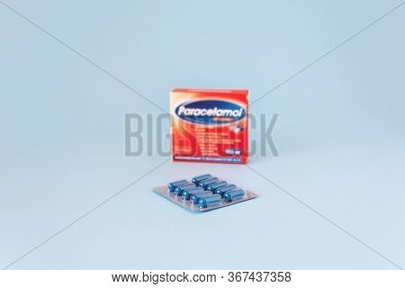 Paracetamol Acetaminophen 500 Mg And Blister With Blue Pills On Blue Background. Advice On Taking Pa