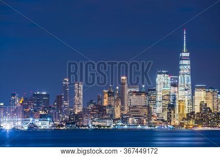 New York,usa, 08-25-17: New York City Skyline  At Night With Reflection In Hudson River.