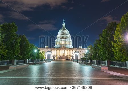 The United States Capitol Building At Night.