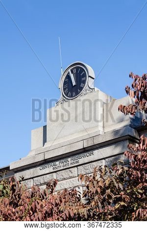 New York City - October 22:  A Clock Face Beside The Jackie Onassis Reservoir In Central Park, New Y