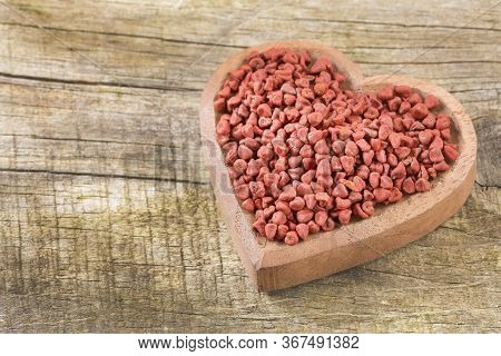 Organic Achiote Seeds - Bixa Orellana. White Background