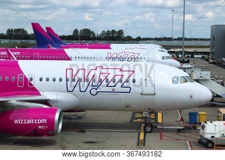 Luton, Uk - July 12, 2019: Wizz Air Airbus A320 Fleet At London Luton Airport In The Uk. It Is Uk's 