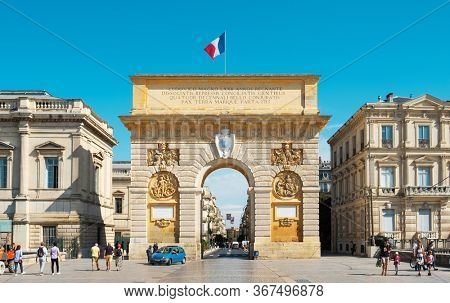 MONTPELLIER, FRANCE - SEPTEMBER 19, 2019: A view of the Porte du Peyrou gate in Montpellier, France, a triumphal arch facing the Jardin du Peyrou garden
