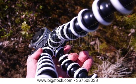 Flexible Tripod For The Camera. Details And Close-up