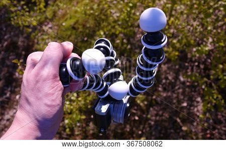 Flexible Tripod For The Camera. Details And Close-up