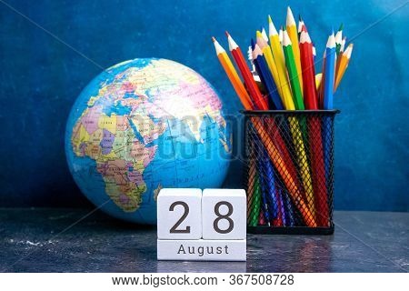 August 28 On The Wooden Calendar.the Twenty-eighth Day Of The Summer Month, A Calendar For The Workp