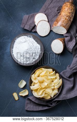 Brazilian Cuisine Food, Latin Snack. Yucca, Yuca, Cassava, Manioca Chips And Flour On A Table. Top V