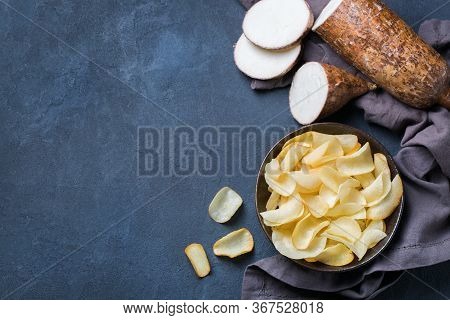 Brazilian Cuisine Food, Latin Snack. Yucca, Yuca, Cassava, Manioca Chips On A Table. Top View Flat L