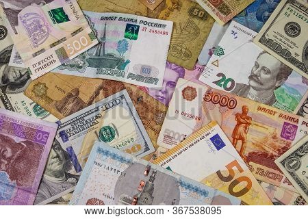 Multicurrency Background Of Euros Us Dollars, Russian Rubles, Egyptian Pounds And Ukrainian Hryvnias