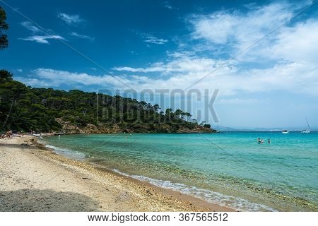 Porquerolles, France - June 10, 2019 : People On The Beach Of Notre Dame (our Lady) In Porquerolles,