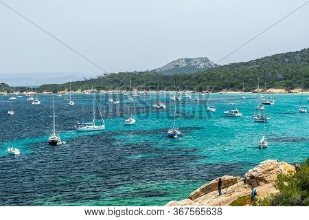 Porquerolles, France - June 10, 2019 : People On The Beach Of Courtade In Porquerolles, One Of The M