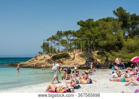 Porquerolles, France - June 10, 2019 : People On The Silver Beach (plage D'argent) In Porquerolles, 