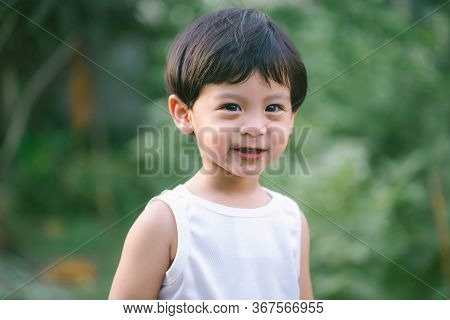Asia Boy He Mouth Aftertaste From Eating Chocolate Ice Cream  Or Chocolate Dessert. A Sweet-toothed 