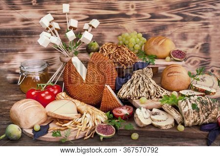 Traditional Italian Smoked Cheese, Traditional Polish Smoked Cheese, Chechil Cheese On The Wood Back