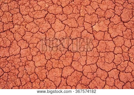 Nature Background Of Cracked Dry Lands. Natural Texture Of Soil With Cracks. Broken Clay Surface Of 