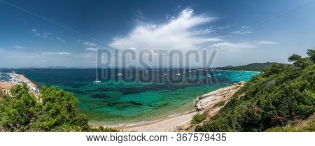Porquerolles, France - June 10, 2019 : People On The Beach Of Courtade In Porquerolles, One Of The M