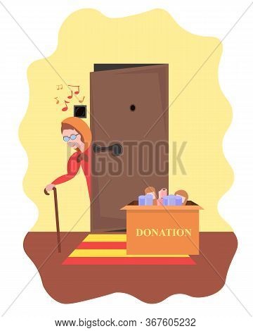 The Donation Box Is Under The Door. An Elderly Woman Picks Up Contactless Delivery. Assistance To Th