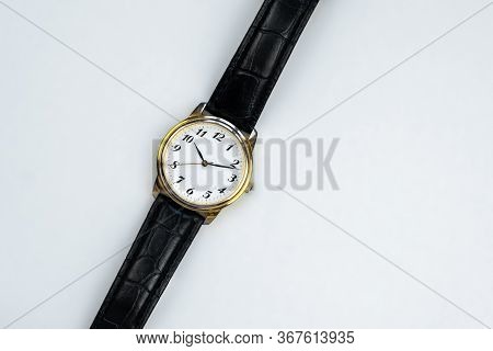 Retro Golden Wristwatch With Roman Numerals  And Croco Leather Belt Isolated Close Up On White Backg