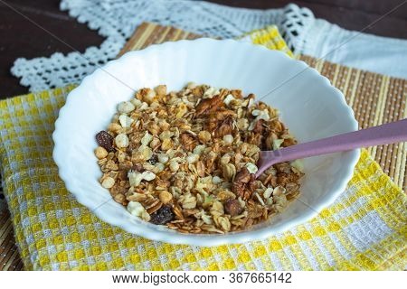 Healthy Lifestyle. Healthy And Nutritious Muesli In A Plate. For Breakfast-natural Muesli With Nuts.