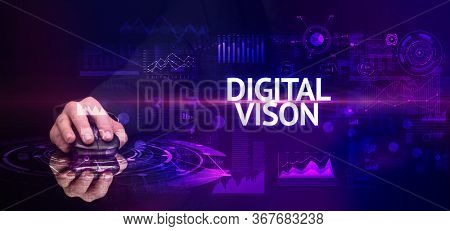 hand holding wireless peripheral with DIGITAL VISON inscription, modern technology concept