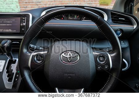 Novosibirsk/ Russia - May 03 2020:  Toyota Sienta, Prestige Car Interior With Dashboard, Steering Wh