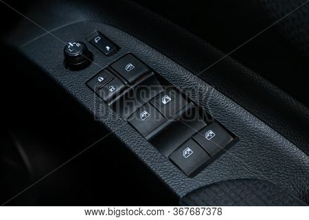 Novosibirsk/ Russia - May 03 2020:  Toyota Sienta, Close-up Of The Side Door Buttons: Window Adjustm