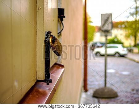 Fragment Of The Old Wrought Doors. Antique Shop Door In Tallinn, Estonia. Closed Business Concept. S
