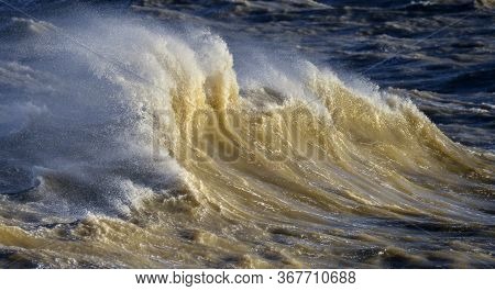 Stunning Image Of Individual Wave Breaking And Cresting During Violent Windy Storm With Superb Wave 