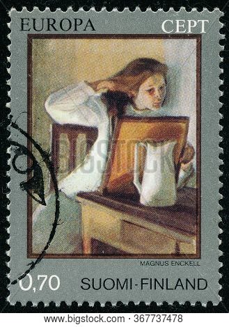 Poltava, Ukraine - May 24, 2020. Vintage Stamp Printed In Finland Circa 1975 How Paintings Knut Magn