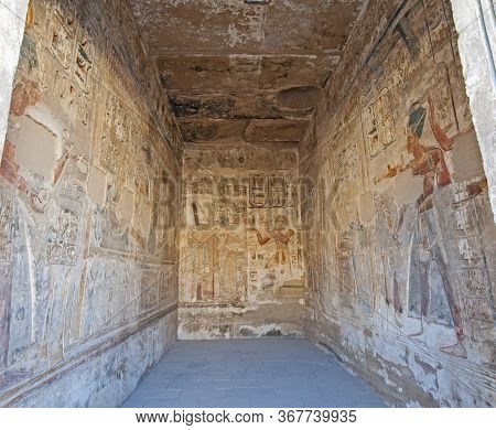 Hieroglypic Carvings And Paintings On Interior Room Wall At The Ancient Egyptian Temple Of Medinat H