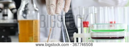 Oil Sample, Chemical Experience In Laboratory. Test Tubes And Trial Amount Oil Are On Table. Experim