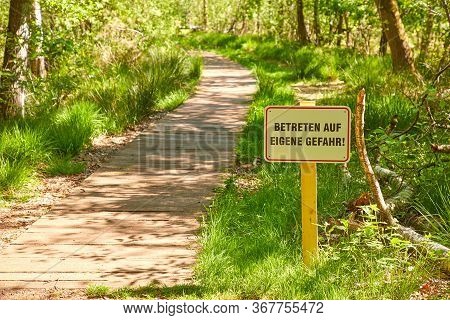 Wooden Path Through The Venner Moor, A Nature Reserve In The Municipality Of Senden In North Rhine-w