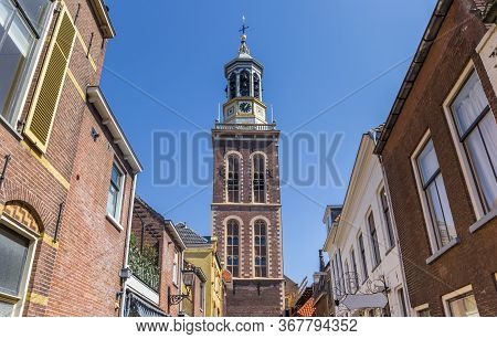 Street With Old Houses Leading To The Historic Belfry Of Kampen, Netherlands