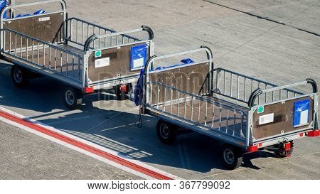 Image Of Empty Luggage Transportration Cart In Empty Airport Because Of Global Economy Crisis Caused