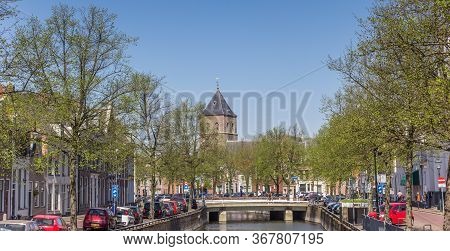 Kampen, Netherlands - April 22, 2020: Historic Canal And Church Tower In Kampen, Netherlands