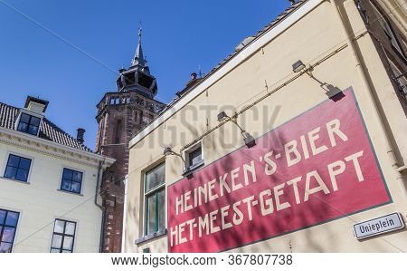 Kampen, Netherlands - April 22, 2020: Retro Beer Advertisement On The Wall Of A Cafe In Kampen, Neth