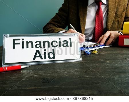 Financial Aid Title On The Plate In The Office.