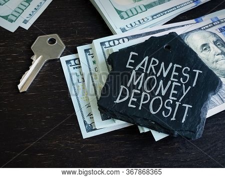 Earnest Money Deposit Label And Stack Of Money.