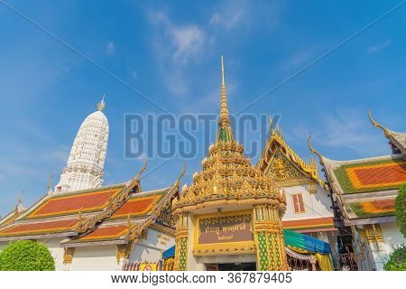 Wat Rakhang Khositaram, A Buddhist Temple Stupa At Noon With Blue Sky In Bangkok City, Thailand. Tha
